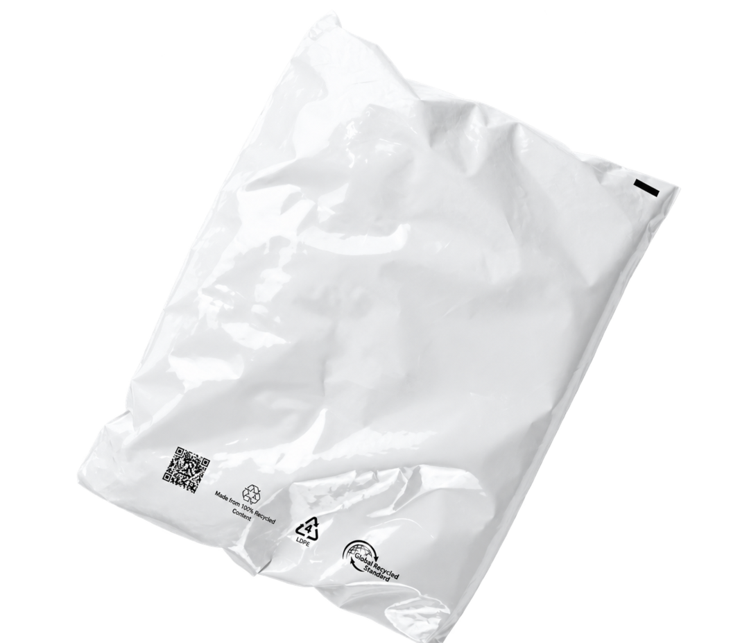 Mockup of the 100% recycled, white Autobag mailer developed for Saks OFF 5TH e-commerce shipments, shown on a clean white background