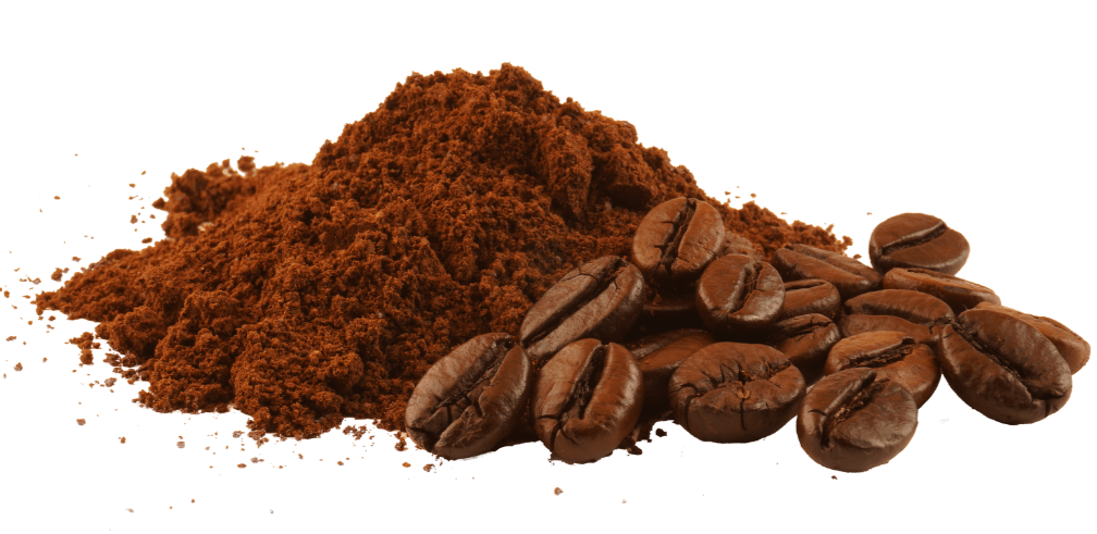 Pile of coffee grounds and roasted coffee beans.